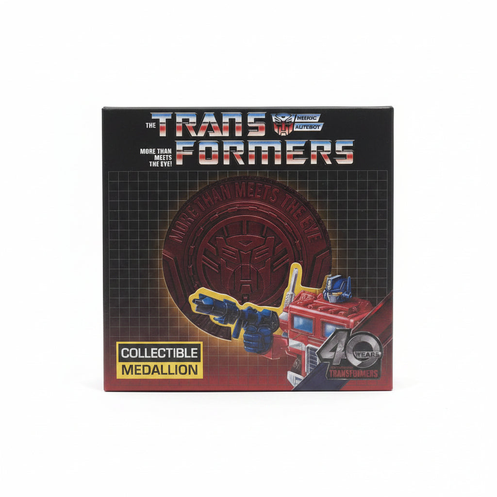 Transformers collectible medallion packaging on a gray background